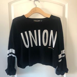 Crop black light sweatshirt | New York & company